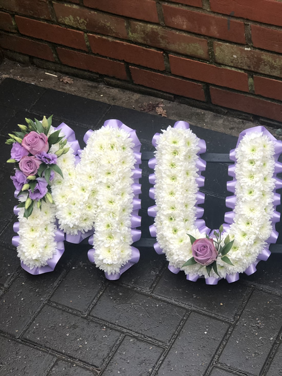Funeral & Sympathy Flowers in Colchester Vanilla Blue Flowers